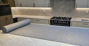 Gator Guard Glufelt countertop floor‑and‑surface protection roll partly unrolled on countertop