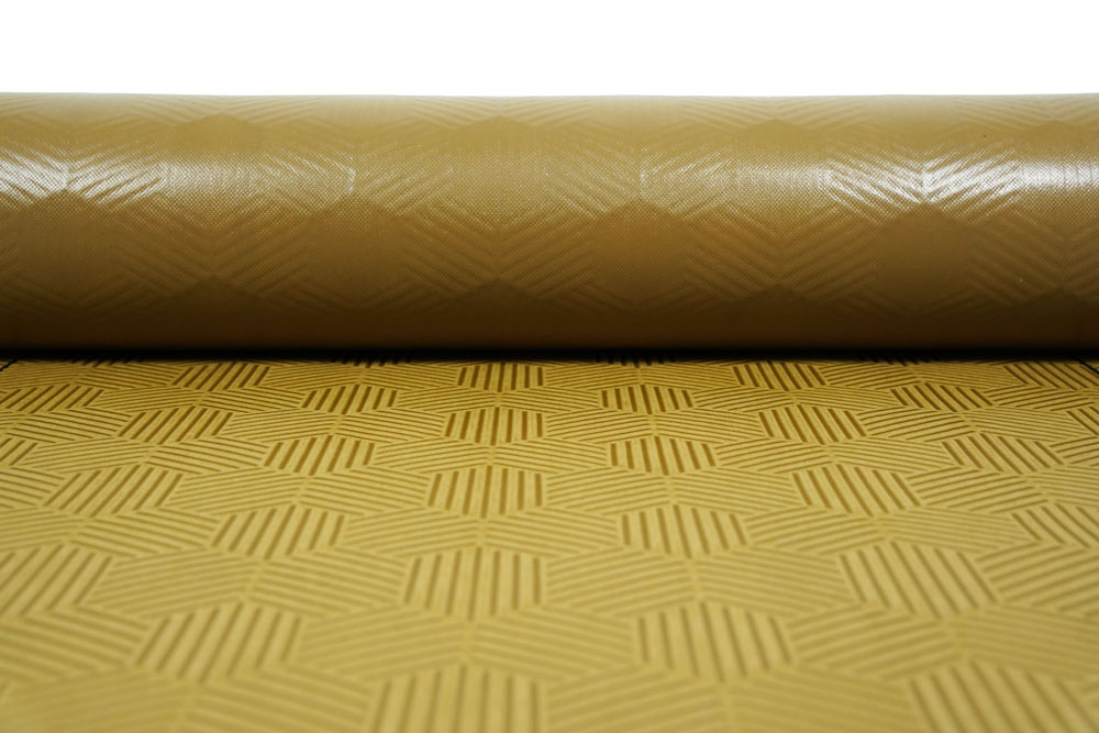 Gator Guard® Gold heavy-duty construction paper floor protection roll showing close-up hexagonal texture — reusable alternative to Ram Board.